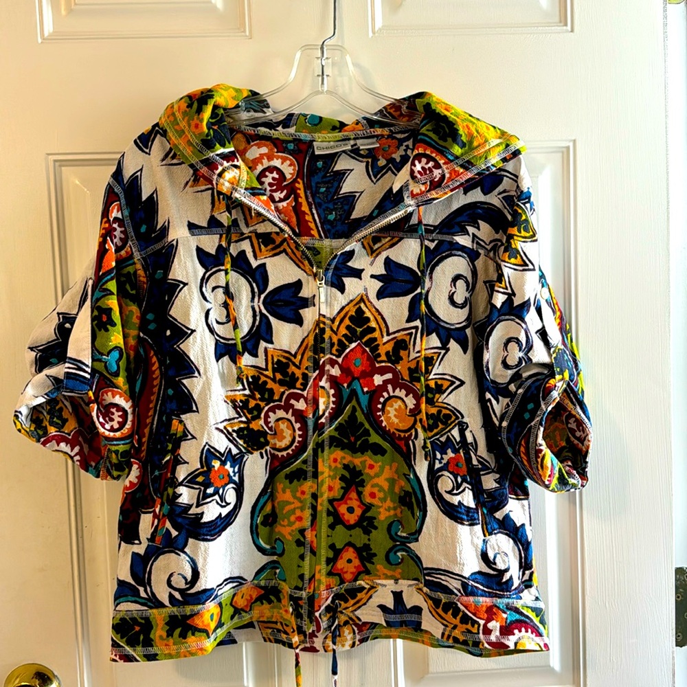 Chico women’s size 1, multi color, modern design, hooded, cotton jacket.